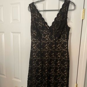 Black sheath with nude underlay. Sexy stretch